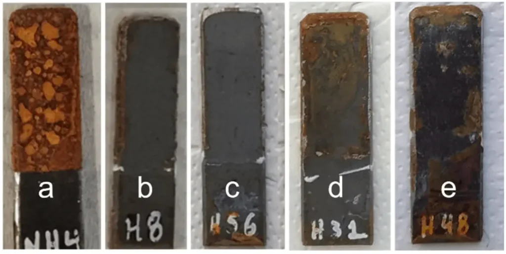 Figure 2. Optical images of representative soft steel samples after 4 days of sulfuric acid spray testing: (a) no coating; (b) with C6 coating; (c) with C5 coating; (d) with C2 coating; (e) with C4 coating.