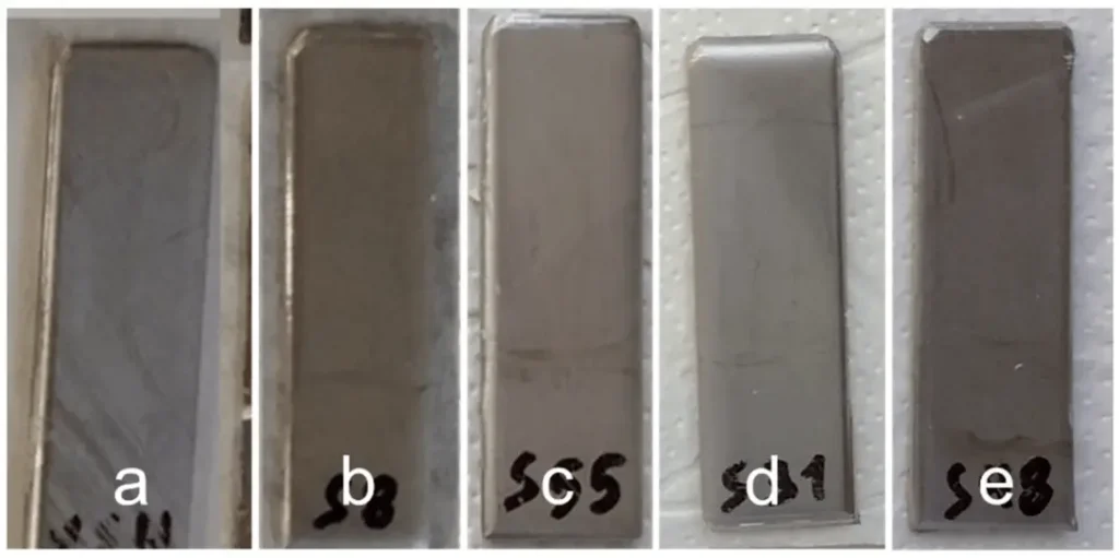 Figure 3. Optical images of representative stainless steel samples after 4 days of sulfuric acid spray testing: (a) no coating; (b) with C6 coating; (c) with C5 coating; (d) with C2 coating; (e) with C4 coating.